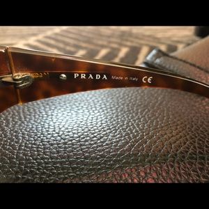 Prada omens sunglasses